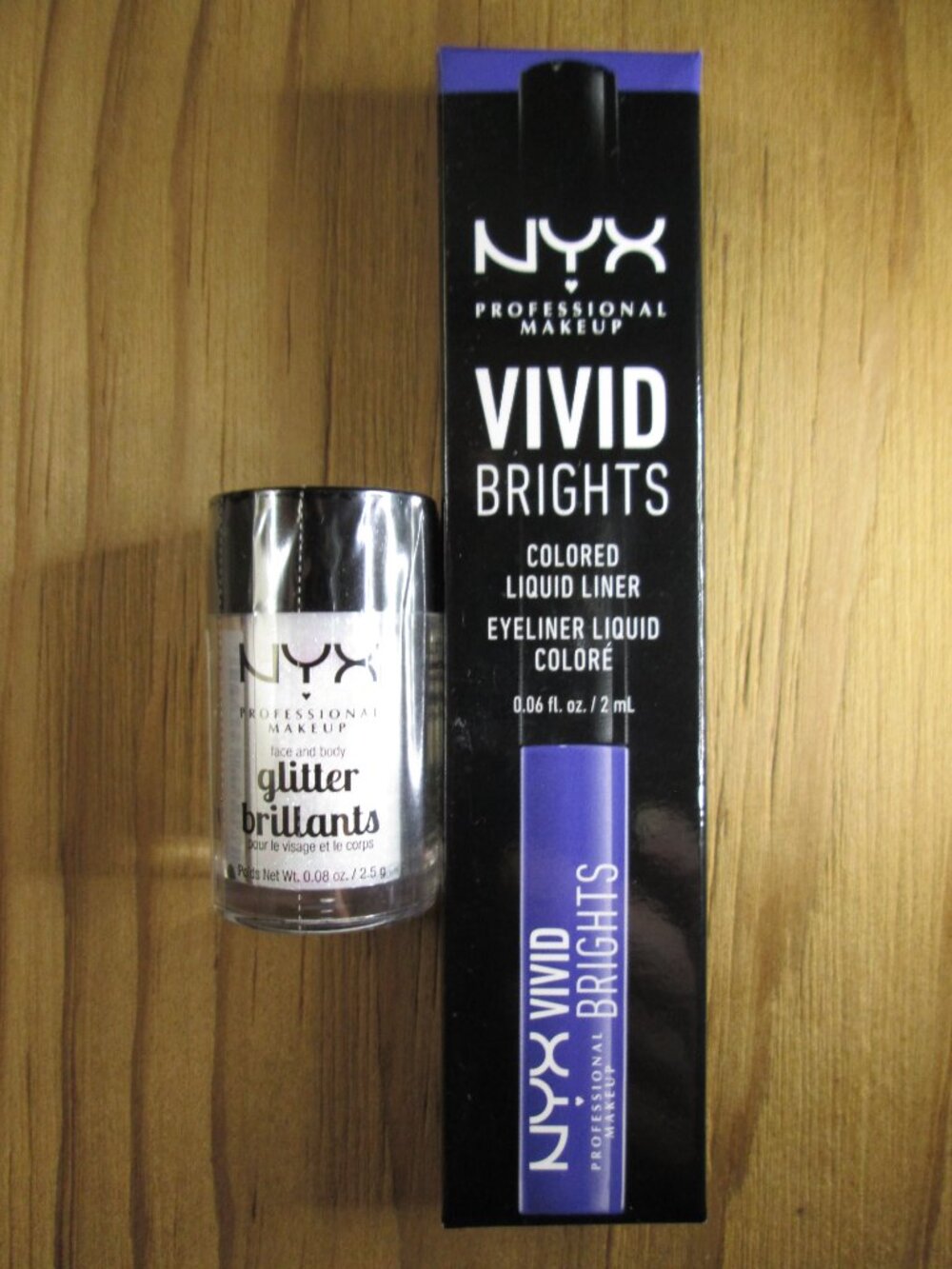 NYX Bundle:  Vivid Brights Vivid Sapphire Eyeliner plus face and body Glitter